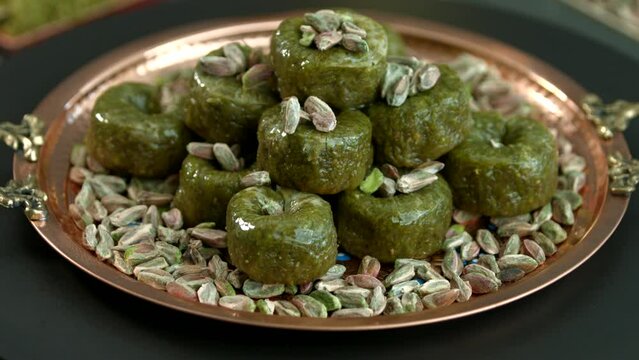 Traditional turkish baklava pistachio pastry. Dilberdudagi, ozel kesim baklava, cikolatali baklava, fistikli baklava, katmer, fistikli kadayif, kattafi, fistik sarma, soguk baklava, midye baklava, cev