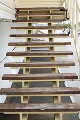 View of old shabby wooden stairs outdoors