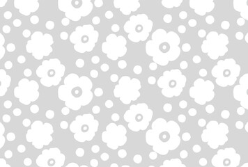 ナチュラルな白の花柄と水玉のグレーの壁紙
