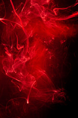 Red smoke motion on black background.