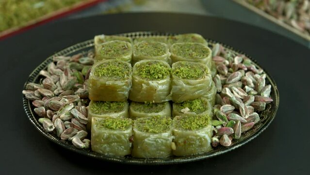 Traditional turkish baklava pistachio pastry. Dilberdudagi, ozel kesim baklava, cikolatali baklava, fistikli baklava, katmer, fistikli kadayif, kattafi, fistik sarma, soguk baklava, midye baklava, cev