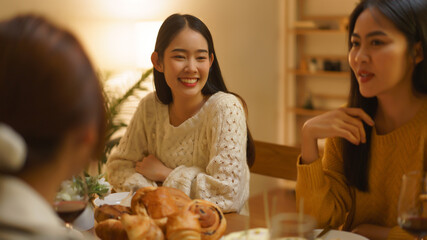 Birthday party concept, Asian girls talking together in dinner with celebrating birthday party