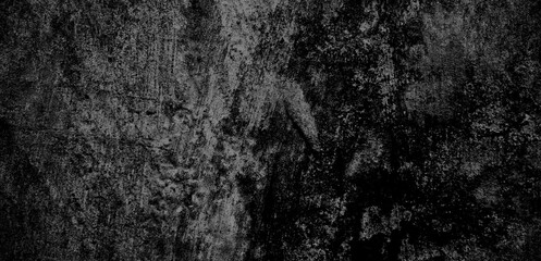 Fototapeta na wymiar Spooky yet seductive dark mixed black background in every texture on the concrete wall.