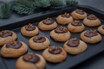 sweet home made chocolate christmas cookies on a christmas table