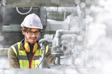 Engineer inspecting his own work within the factory