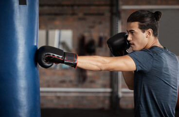 Boxing, exercise and man with focus for fight training and gym fitness ready for sports. Workout,...