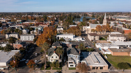 Fototapeta na wymiar Afternoon aerial view the downtown area and surrounding neighborhoods of Marysville, California, USA.