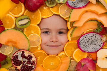 Fototapeta na wymiar Vitamins from fruits. Mix of fruits near kids face. Assorted mix of summer fresh fruits. Healthy nutrition for kids.