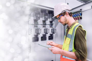 Engineer inspecting his own work within the factory