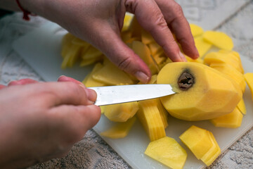 peeling spoiled potato