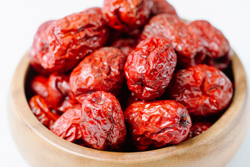 fresh korean jujube fruit in wood bowl