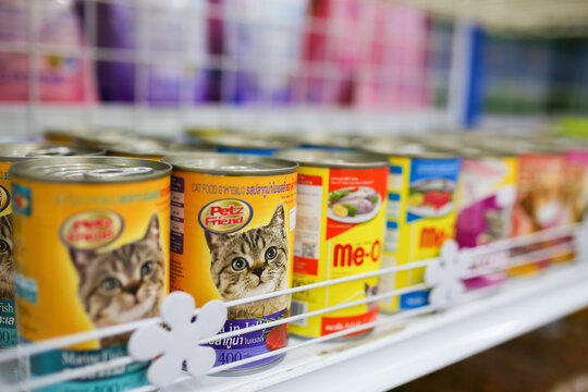 Nakhonsawan, Thailand - January 18, 2023: Picture of pet food in supermarket. Cat and dog food, Chicken food.