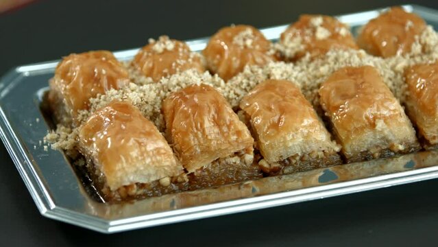 Traditional turkish baklava pistachio pastry. Dilberdudagi, ozel kesim baklava, cikolatali baklava, fistikli baklava, katmer, fistikli kadayif, kattafi, fistik sarma, soguk baklava, midye baklava, cev
