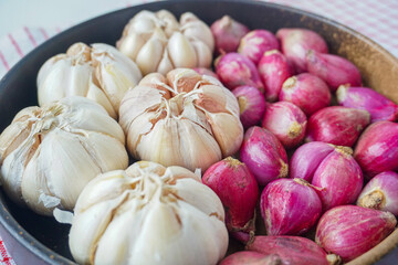 Shallot and Garlic in Brown Bowl with close up and flat lay view