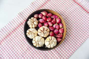 Shallot and Garlic in Brown Bowl with close up and flat lay view