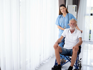 Female woman lady girl person doctor nurse staff assistant health care treatment wheel chair older man people handicap nursing home white isolated background copy space caregiver indoor hospital    