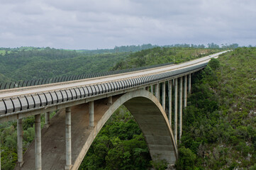 Fototapeta na wymiar Landscape shot of bridge with nature background