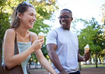 Interracial couple, laughing and ice cream for funny joke, conversation or bonding together in the park. Happy man and woman sharing laugh with smile for humor, trip or holiday with desert in nature