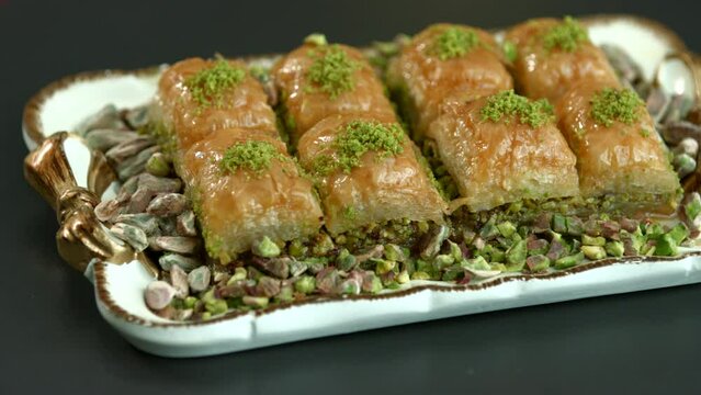 Traditional turkish baklava pistachio pastry. Dilberdudagi, ozel kesim baklava, cikolatali baklava, fistikli baklava, katmer, fistikli kadayif, kattafi, fistik sarma, soguk baklava, midye baklava, cev