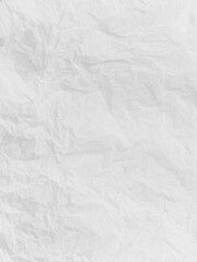 Abstract wrinkled or Free photo crumpled white paperboard or empty canvas or paper surface with folded stains.