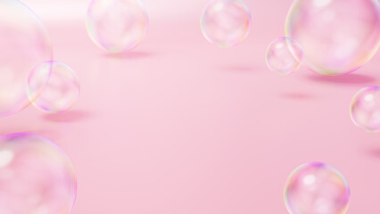 ピンク色の背景にシャボン玉が複数ある空間。（横長）