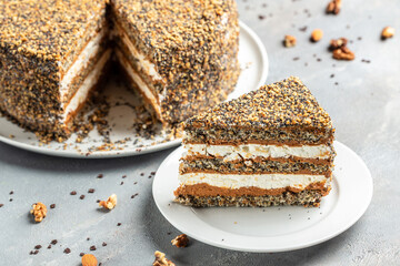 layered cake with cakes nut in condensed milk, Food recipe background. Close up. Layered poppy cake