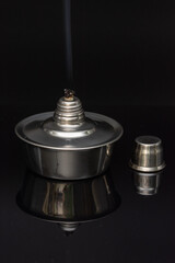  Spirit lamp, with cover, used as a heat source or for sterilization.