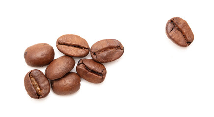 Roasted coffee beans isolated on white background.