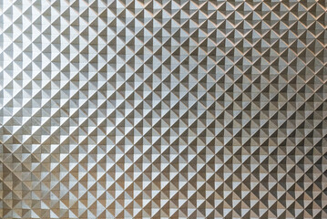 Geometric patterns formed by a architectural wall.