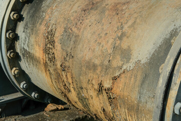 Pipe is installed along the bridge on the pipe support. Water steel pipes for community utilities.