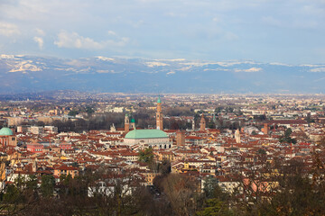 Fototapeta na wymiar Panorama of VICENZA city in Italy and the famous monument called BASILICA PALLADIANA with the tower