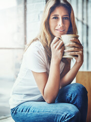 Coffee, portrait and woman smelling the aroma while relaxing in her home on a weekend morning. Happy, relax and female from Columbia smell the caffeine scent while enjoying a hot drink in her house.