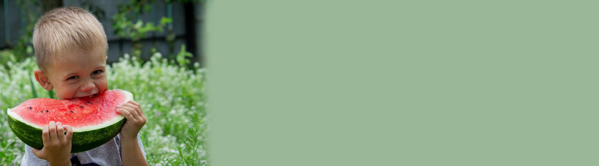 A child eats watermelon. Selective focus.