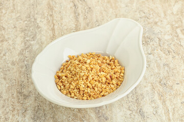 Crunched roasted peanut in the bowl
