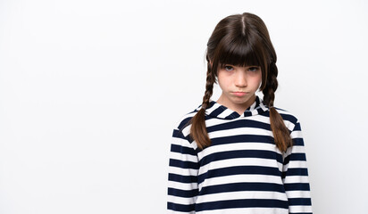 Little caucasian girl isolated on white background with sad expression
