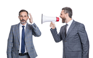 two businessmen ignore shouting loud in megaphone. businessmen ignore shouting in megaphone