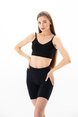Fototapeta premium Beautiful sporty woman on white background