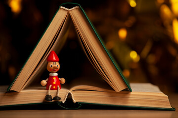 image of wooden toy book dark background 
