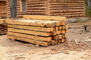 Stacks of firewood for industrial use..The firewood is stacked for the winter in a pile of logs.