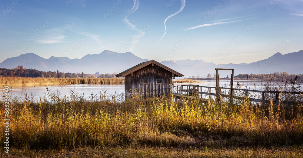 Fototapete Scenic nature landscape. Sunrise on Chiemsee lake with vivid sky. Wonderful sunny mountain valley under sunlight Beautiful alpine summer view near Rimsting at famous Chiemsee, Bavaria, Germany