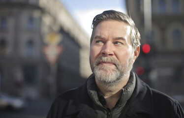 portrait of a adult  man in the street