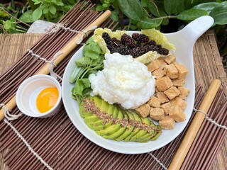 Avocado with fried egg tofu and vegetable