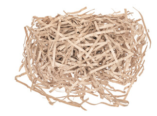 Kraft paper shavings isolated on white background. gift box filler. sawdust cardboard