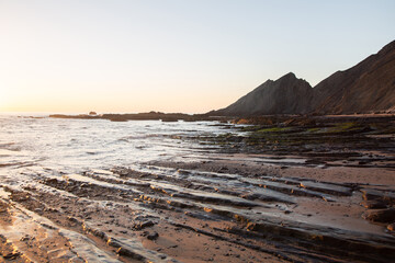 Dusk on Rocks and Sea at Amoreira Beach; Algarve; Portugal