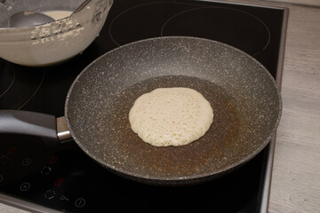 Making pancakes on frying pan. Step-by-step recipe for making pancakes. Step 6