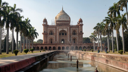 Indian park, ancient temple through a patterned doorway