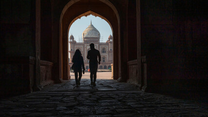 Indian park, ancient temple through a patterned doorway