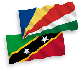 Flags of Federation of Saint Christopher and Nevis and Seychelles on a white background