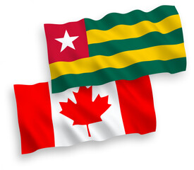 Flags of Canada and Togolese Republic on a white background