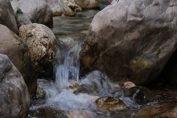 water flowing over rocks 
